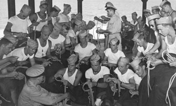 merchant marines teaching army air force how to tie knots
