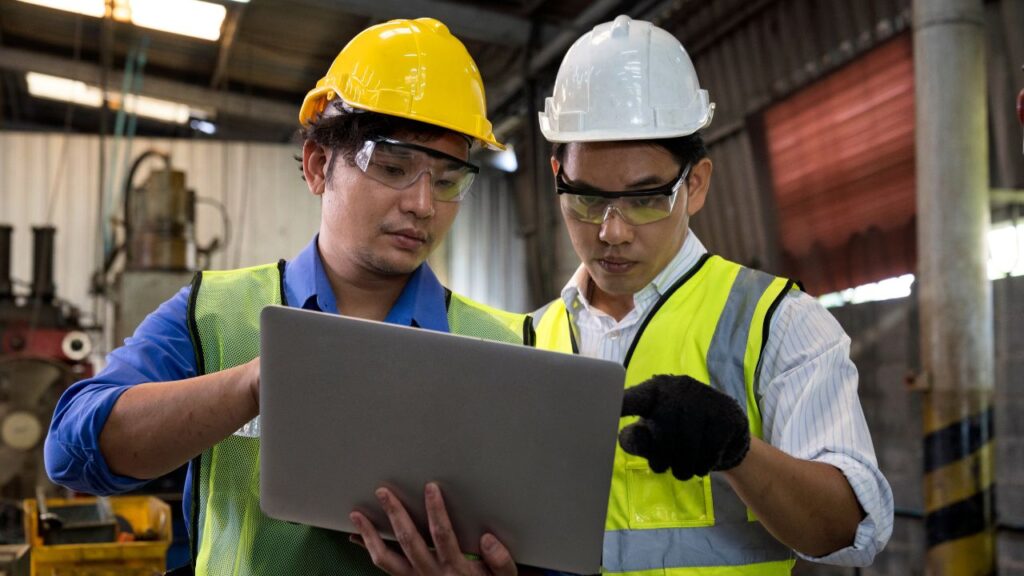 predictive maintenance in manufacturing two people working