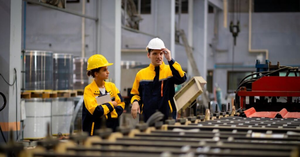 factory workers using cmms system