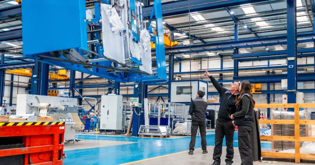 inspecting machinery in factory