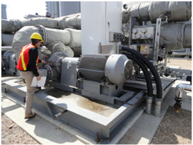 checking factory equipment outside