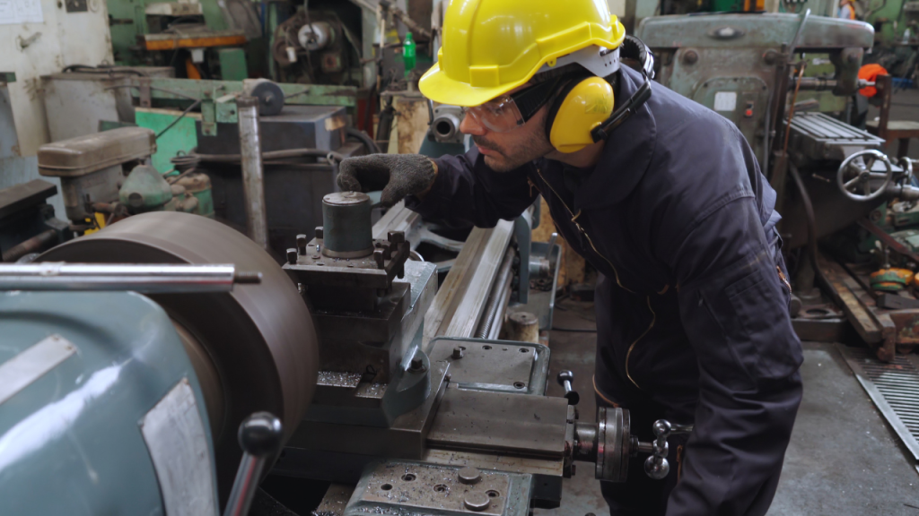 working on factory equipment